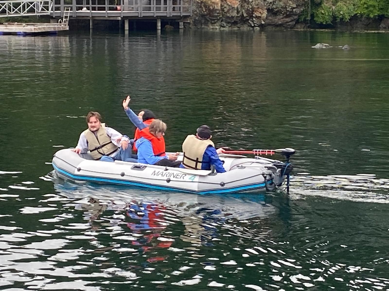 Family in the electric dinghy